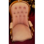 A mid-Victorian mahogany and pink floral buttoned upholstered spoonback armchair, width 60cm,