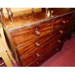 A mid-19th century mahogany square front chest of two short over three long graduated drawers (