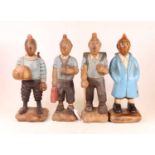 A set of four modern carved softwood and polychrome pained figures, each in the form of Tintin, h.