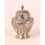 A Victorian silver canister, the hinged domed cover with wrythen decoration and teardrop finial, the