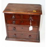 A Victorian apprentice piece mahogany chest of two short over three long drawers, on plinth base,