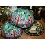 A pair of modern Tiffany style coloured and leaded glass ceiling light fittings, dia.36cm;