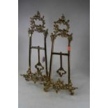 A pair of modern brass easel photograph frames, having Rococo style C-scroll decoration, h.54cm