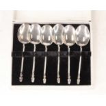 A cased set of six white metal spoons, replicas of the utensils used during the 5th century BC in