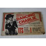 A child's novelty The Amazing Dancing Charlie Illusion, the printed card model of Charlie Chaplin,