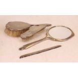 George V hallmarked silver dressing table set comprising of a mirror and two brushes