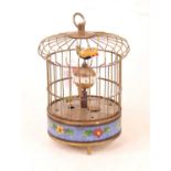 A reproduction singing bird in cage clock automaton, h.21cm