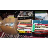 Seven boxes containing various model related hardback books and accessories, to include Hornby