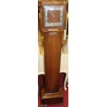 An Art Deco oak grandmother clock, having a striking and chiming movement (lacking pendulum), height