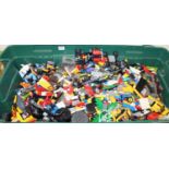 A large tub containing a quantity of mixed Lego and Mega Blocks