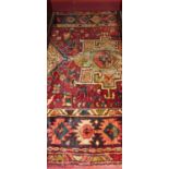 A Persian Heriz red ground hall runner, 338 x 140cm