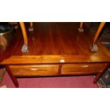 A contemporary Eastern teak square low two drawer coffee table, w.100cm