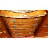 A reproduction figured walnut low bowfront chest, of four long graduated drawers, w.61cm