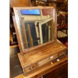 A 19th century mahogany swing dressing mirror, raised on three drawer boxbase (some losses and