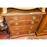 An early 20th century mahogany chest, of four long graduated drawers, raised on ogee bracket