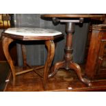 An early 19th century mahogany circular tilt-top pedestal tripod occasional table (with repaired