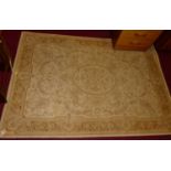 A Laura Ashley cream ground floral decorated rug, 198 x 137cm