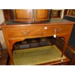 An Edwardian mahogany and satinwood inlaid rexine inset two drawer writing table, w.105cm