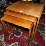 A 1960s G-Plan teak nest of three occasional tables, the largest w.53.5cm