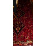 A Persian Tabriz red ground woollen rug, 280 x 210cmCondition report: Appears in good condition