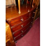 A mid-19th century mahogany bowfront chest, of two short over three long graduated drawers, to squat