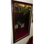 A 19th century mahogany and gilt decorated cushion framed rectangular wall mirror, 71 x 43cm