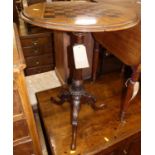 A mid-Victorian figured walnut and chessboard top inlaid circular pedestal games table, dia.50cm