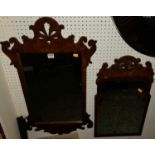 A Chippendale style figured walnut fret carved floral framed rectangular wall mirror, 80.5 x 47cm;
