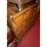 A circa 1800 provincial oak chest, of two short over three long graduated drawers, w.99cm