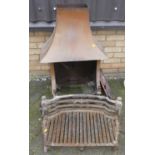 A cast iron fire grate; together with a cast iron and copper fireplace and hood (2)