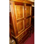 A joined cherry wood side cupboard, having twin upper doors over two short and two long lower