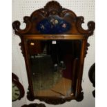 A Georgian style floral carved walnut and figured walnut framed rectangular bevelled wall mirror,