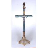 A Victorian brass and polychrome decorated crucifix, the pewter Corpus Christi above a foliate