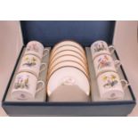A Royal Worcester bone china six-place setting coffee service, each piece decorated with flowers,