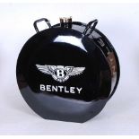 A reproduction Bentley black painted metal fuel can, with brass cap, h.37cm