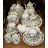 A Wedgwood 12 place setting dinner and tea service in the Beaconsfield pattern