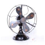 A 1920s General Electric Company black painted electric table propeller fan, h.32cm