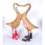 A modern carved bamboo model of two ducks kissing, h.50cm