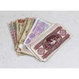 A collection of assorted used foreign banknotes, to include Reserve Bank of India 100 rupees,