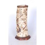 A Japanese Meiji period carved ivory and shibiyama tusk section vase, inlaid with mother of pearl