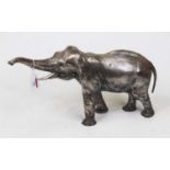 A contemporary alloy figure, naturalistically modelled as an Indian elephant in standing pose with
