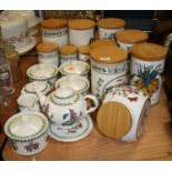 A collection of Portmeirion table wares in the Botanic Garden pattern to include storage jars and