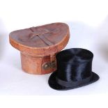 A Victorian gentleman's black moleskin top-hat, inscribed Extra Quality to the interior, housed in a