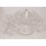 A cut glass fruit bowl together with various drinking glasses
