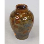 An early 20th century Royal Doulton stoneware vase, of baluster form, decorated in the Autumn Leaves