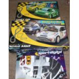 a large group of 3 Scalextric racing sets to include a used but seems complete, World rally set