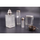 Two silver-lidded jars, a miniature cup by J Picard of 117 Regent St, a scent bottle etc