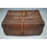A vintage fibre haberdashery clothing box, emblazoned "Cherub for Children, Outgrown before