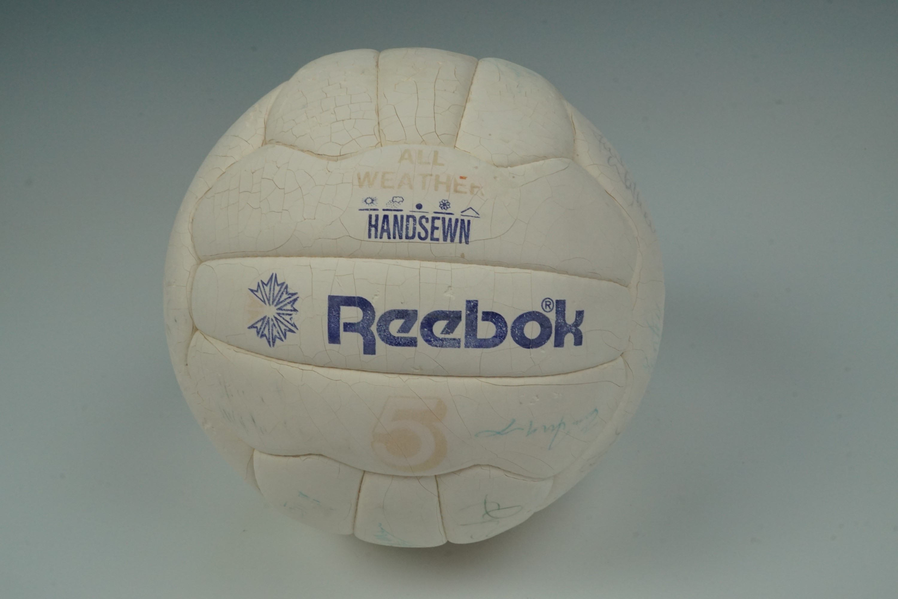 A signed football bearing autographs of 1993-94 Scotland international players including Stuart