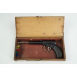 A late 19th / early 20th Century Dolla type air pistol, in original wooden case with darts